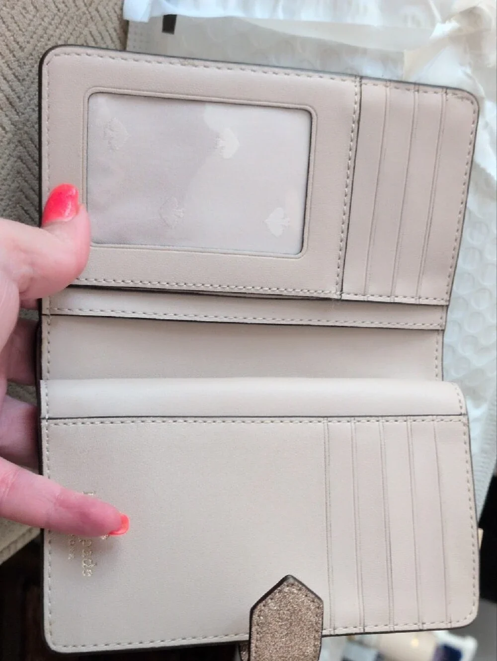 kate spade glitter wallet in rose gold shimmer